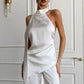 Sexy Backless Satin Halter Top Asymmetrical Hem Sleeveless Blouse with Flowing Strap for Nightclub and Party Events