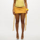 Women Textured Knit Mini Skirt Summer Fashion Solid Color Low Rise Short Skirts with Long Fringe Side Ties and Raw Edges