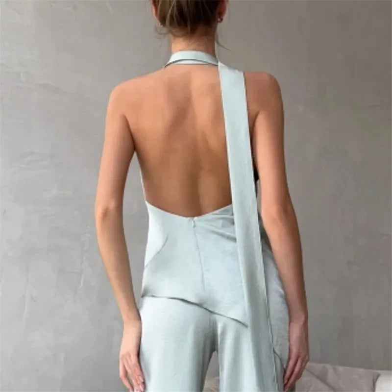 Sexy Backless Satin Halter Top Asymmetrical Hem Sleeveless Blouse with Flowing Strap for Nightclub and Party Events