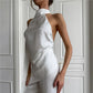 Sexy Backless Satin Halter Top Asymmetrical Hem Sleeveless Blouse with Flowing Strap for Nightclub and Party Events
