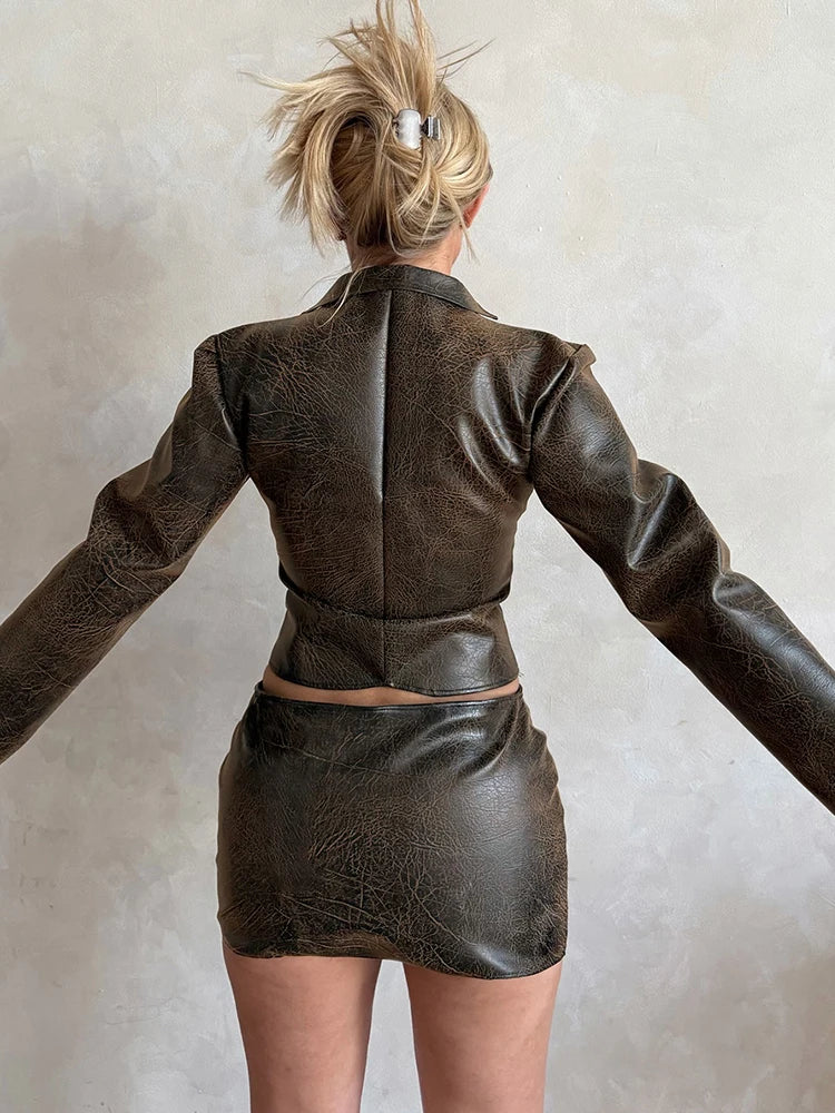 Hottie Leather 2 Piece Set Women Fashion Single-Breasted Low-Neck Full Sleeve Jacket+Mini Peach Hip Skirt Streetwear