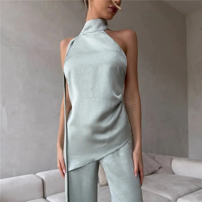 Sexy Backless Satin Halter Top Asymmetrical Hem Sleeveless Blouse with Flowing Strap for Nightclub and Party Events